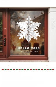 Detail of white snowflake window sticker with Hello 2026 text for Christmas shop decor