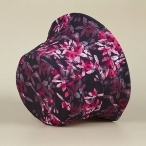Reversible bucket hat featuring purple leaf digital prints on black canvas fabric