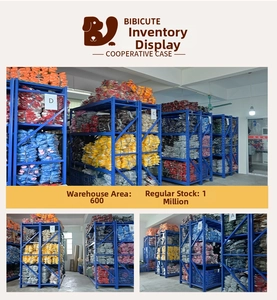 Large warehouse inventory of breathable foldable pet carrier bags for cats and dogs.