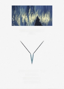 Macro detail of silver V-shaped pendant necklace with turquoise stones and black metal chain