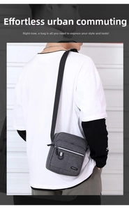 Men's dark grey oxford fabric crossbody bag with adjustable nylon strap and D-ring detail