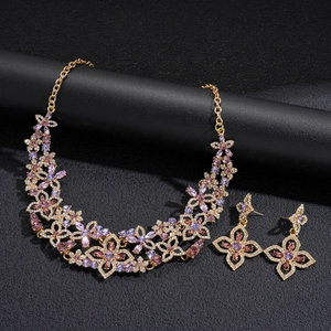 Luxurious flower jewelry set with purple crystals and gold plated necklace and earrings