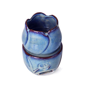 Blue tulip ceramic aroma burner with reactive glaze finish and embossed floral patterns