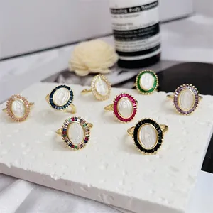 Set of 8 gold-plated rings with Virgin Mary shell cameo and colorful zircon stones