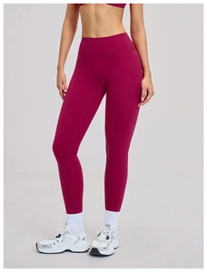 Detail of high-waist rose red yoga pants showing high-elastic seamless fabric texture