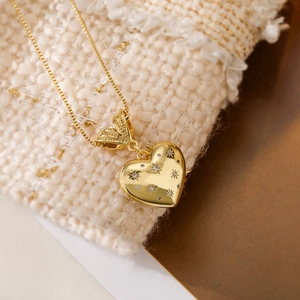 Elegant 18K gold plated copper heart pendant necklace with shimmering zircon accents