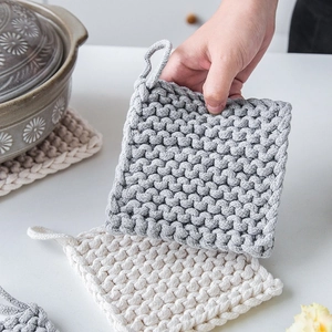 Nordic square woven cotton heat insulation pads in grey and beige with hanging loops