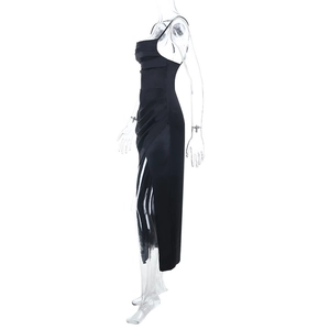 Detail view of black satin slip dress featuring pleated bust and high side slit