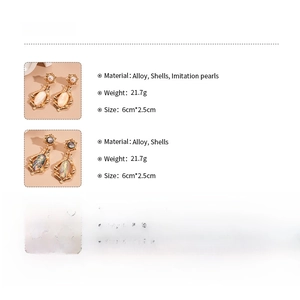 Detailed size and weight information for vintage shell geometric oval drop earrings
