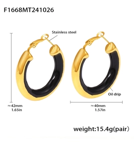 Detail of round black enamel oil drip hoop earrings in 18K gold plated stainless steel