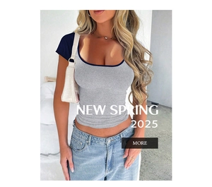 Close-up of ribbed grey t-shirt featuring deep U-neck and navy contrast binding detail