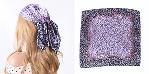 Detail showing purple leopard and pink chain print satin silk square neck hair scarf