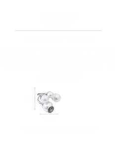 Detail view of silver vintage pearl ring with meander pattern and open band design