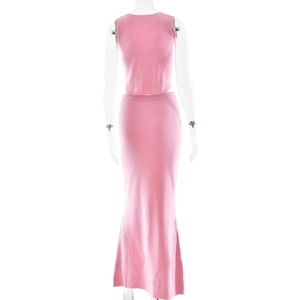 Detail view of pink ribbed knit two-piece set featuring sleeveless top and long skirt back