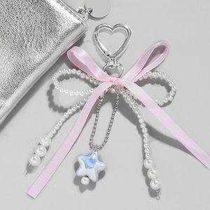Pink lace bow keychain with faux pearls and silver heart star pendant accessory