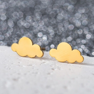 Macro view of gold minimalist cloud-shaped stud earrings in polished 18K gold plating
