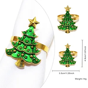 Christmas tree napkin ring with green enamel finish and gold metal base decoration