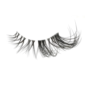 Close-up of natural wispy half false eyelashes with clear band on white background