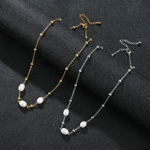 Elegant gold and silver stainless steel necklaces with oval pearls and metal beads set