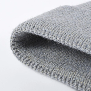 Thick ribbed knit beanie in grey wool blend featuring warm textured weave and fold brim