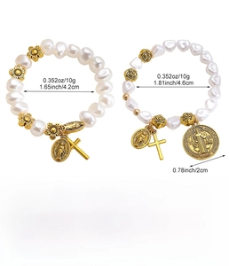 Detailed view of handmade beaded bracelets with Virgin Mary and Saint Benedict medals