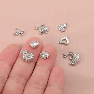 Polished silver stainless steel marine animal charms including turtle and shell for DIY jewelry