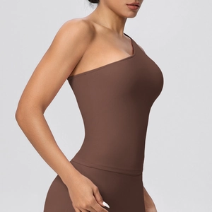 Detail of chocolate brown one-shoulder sports top with supportive elastic fabric
