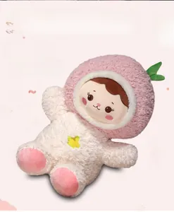 Detailed view of pink peach plush doll with white sherpa texture and star embroidery