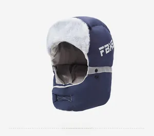 Detail of winter trapper hat with gray faux fur lining and reflective safety strip