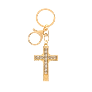 Detailed view of golden cross keychain with shimmering white rhinestones and lobster clasp
