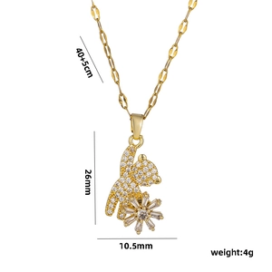 Gold titanium spinning bear necklace with pavé cubic zirconia and sunflower detail