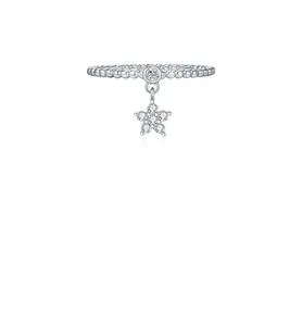 Detail of S925 sterling silver beaded ring featuring a sparkling star pendant with pavé stones