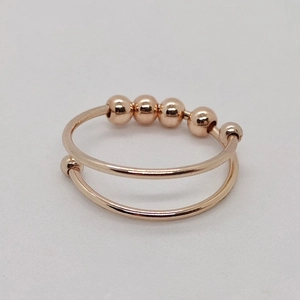 Rose gold stainless steel double layer anxiety ring with four rotatable metal beads