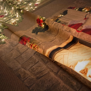 Detail showing the fine texture and high-quality Christmas fireplace print on fabric