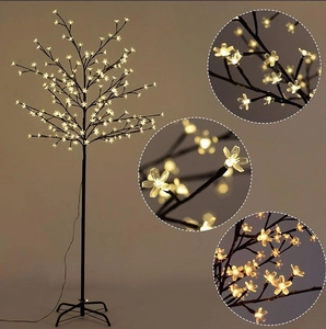 Decorative LED cherry blossom tree floor light with warm yellow glow and steady metal base