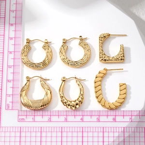 Assorted vintage stainless steel geometric earrings with textured gold plating finishes