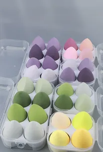 Close-up of colorful teardrop makeup sponges in a clear egg-box organizer case