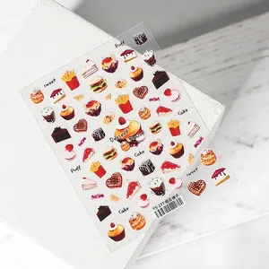Stereo 5D dessert-themed nail art stickers with cakes and donuts on white background
