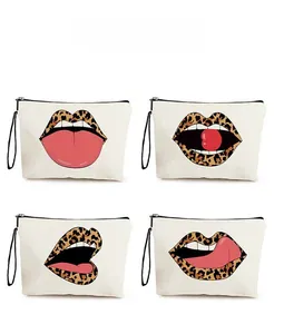 Detail showing four styles of canvas makeup bags with leopard lip patterns and zippers