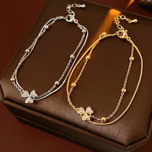 Zweilagiges Armband Damen Kupfer Zirkon Kleeblatt Blumenanhänger Schlangenkette Perle Verstellbarer Modeschmuck