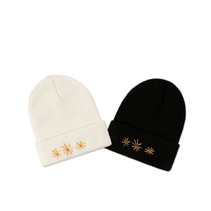 Winter knitted beanies in black and beige with three golden flower embroidery set