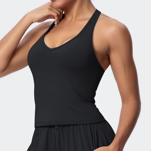 Close-up of side profile of a black V-neck yoga sports bra with slim straps and sleek fit