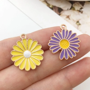DIY daisy flower enamel charms in yellow and purple colors with gold alloy finish