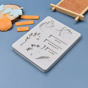 Silicone mold featuring pumpkin, maple leaf, and sunflower with GIVE THANKS FALL text