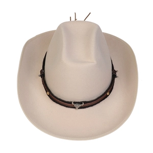 Detail of cream felt cowboy hat featuring leather band with gold studs and silver bull skull