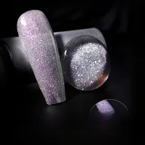 Close-up of glitter silver purple nail polish with reflective diamond gel on nails