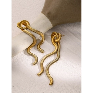 Elegant 16k gold plated stainless steel wavy tassel earrings on minimalist vase