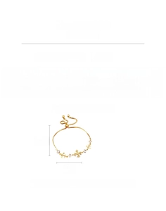Vue détaillée d'un bracelet croix doré de 26 cm de long et pesant 3,5 g