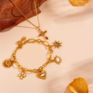 Golden stainless steel jewelry set with evil eye and cross charms and colorful zircon stones