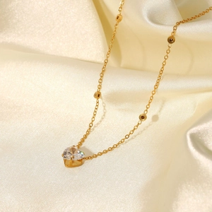 18K gold plated stainless steel necklace with white heart zircon on silk fabric